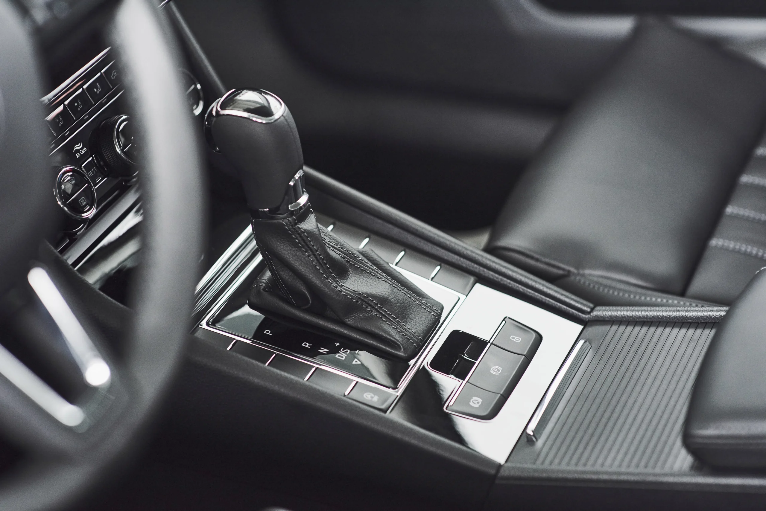 detail-modern-car-interior-gear-stick-automatic-transmission-expensive-car